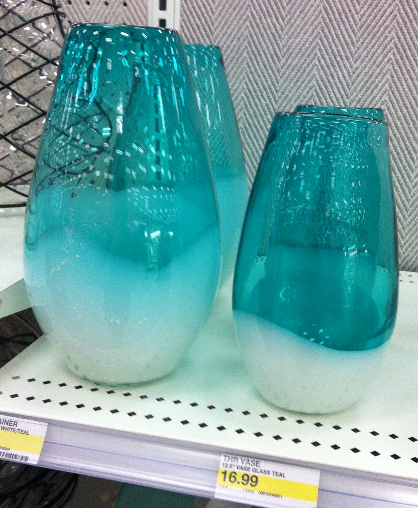 Target blue vases on the shelf.