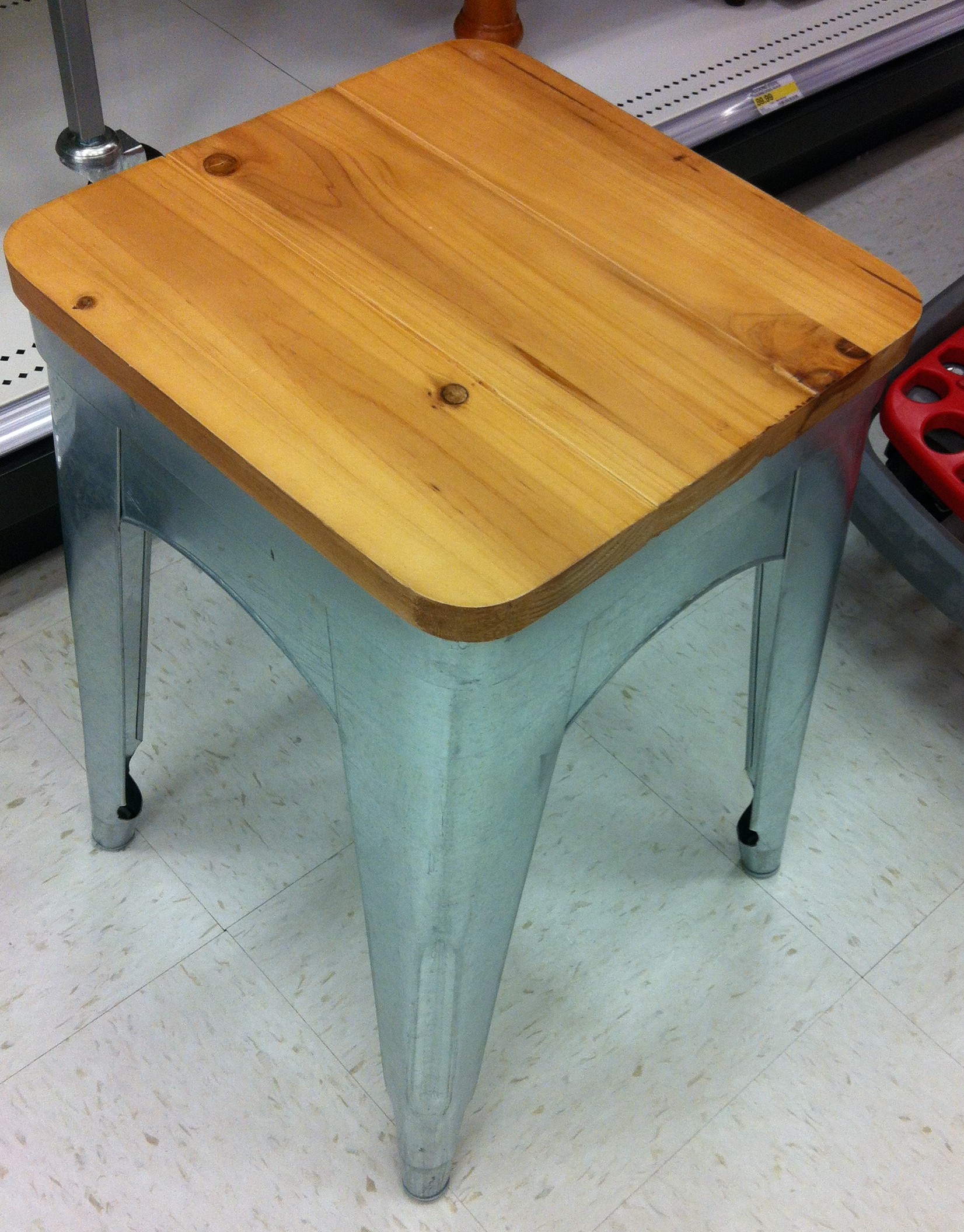 Stool from Target with a wooden top.