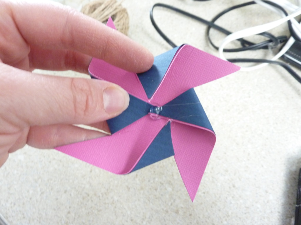 Glue on the center of the pinwheel.