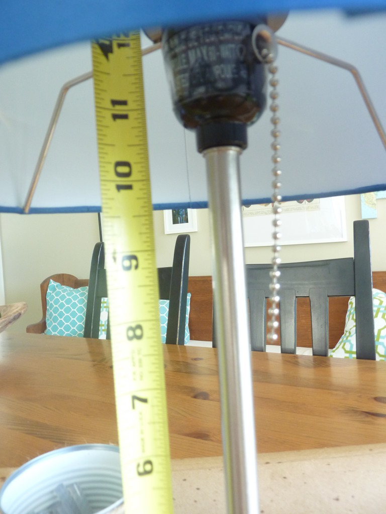 Measuring the base of the lamp.