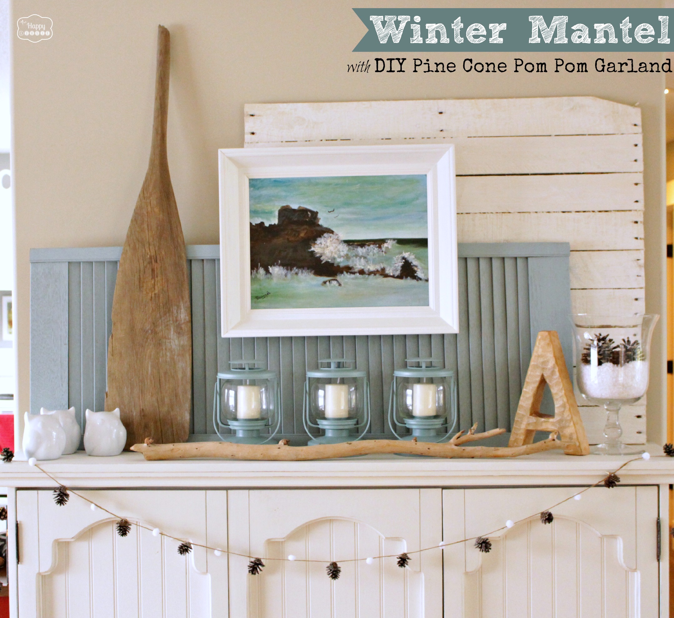 Winter Blues Mantel with a DIY Pine Cone & Pom Pom Garland