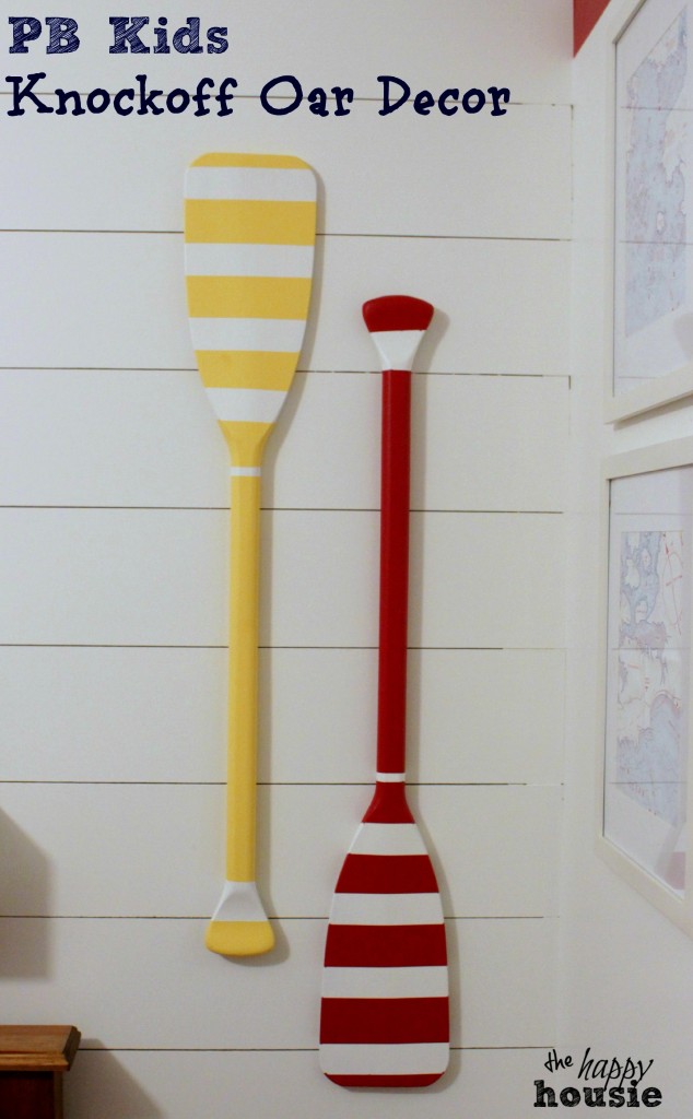 Pottery Barn Kids Knockoff Oar Decor on wall one in yellow and the other oar in red.
