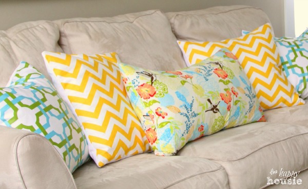 DIY Envelope Lumbar Pillow spring pillows on a couch in the living room.