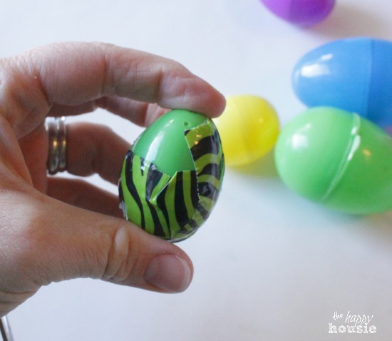 The green and black duck tape on the plastic Easter egg.