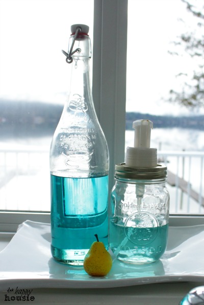 Easy DIY Foaming Soap Dispenser at the sink in front of the window.