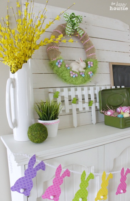 Am Easter display with the wreath and bunny garland.