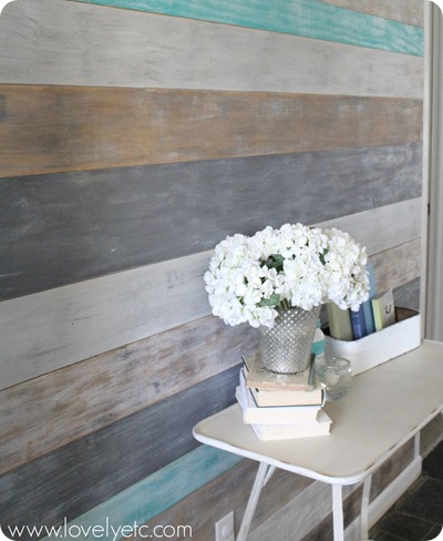 Lovely etc planked wall in turquoise and white and brown.