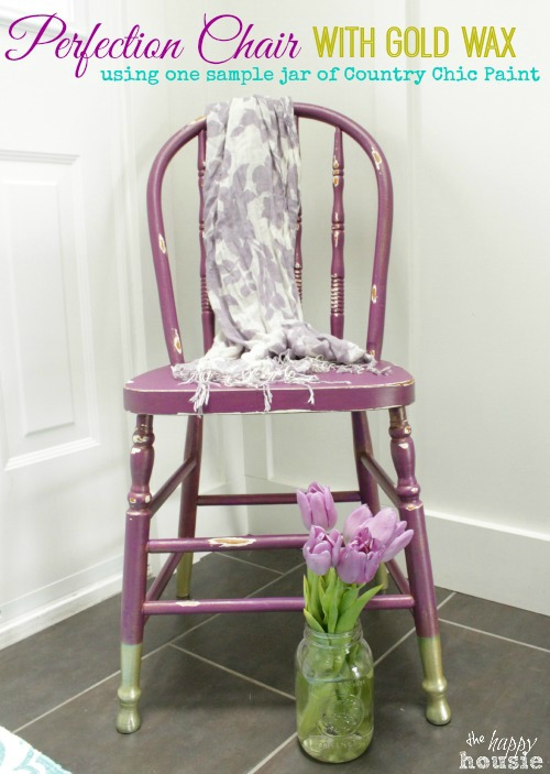 Perfection Chair with Gold Wax and Gold Dipped Feet and purple tulips by the chair.