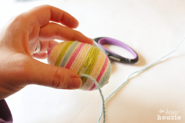 The last bit of yarn wrapped around the egg.