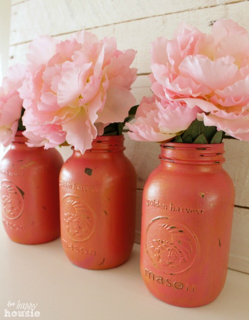 Pink peonies are in the pink mason jars.