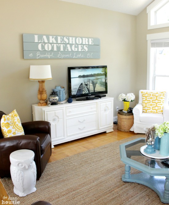 A lakeshore cottages sign in the living room.