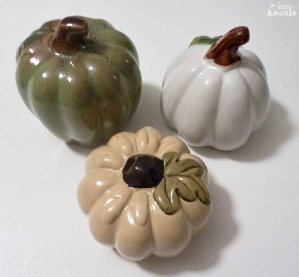 Ceramic pumpkins on the table.