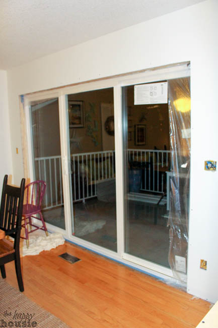 A sliding door installed into the dining room hole in the wall.