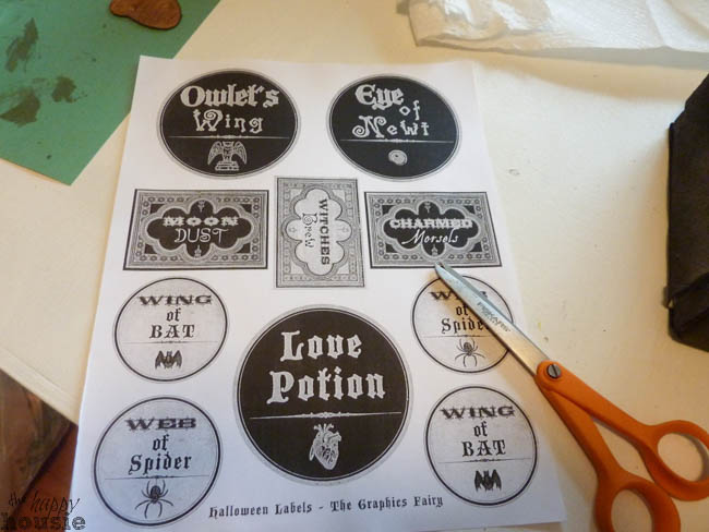 Cutting out some potion labels.