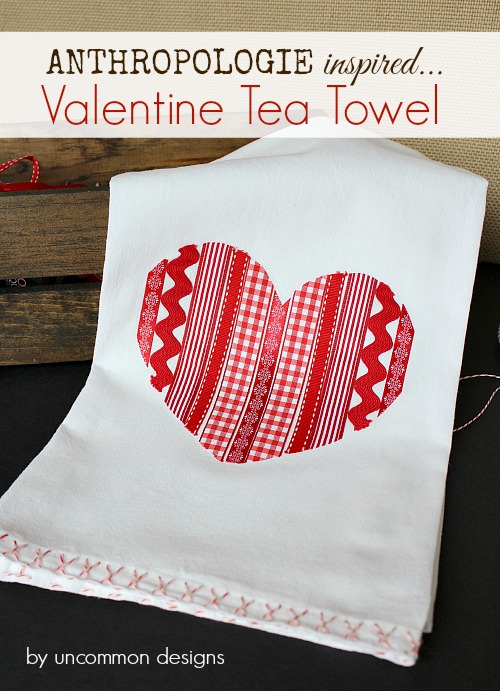 A tea towel with a red heart on it.