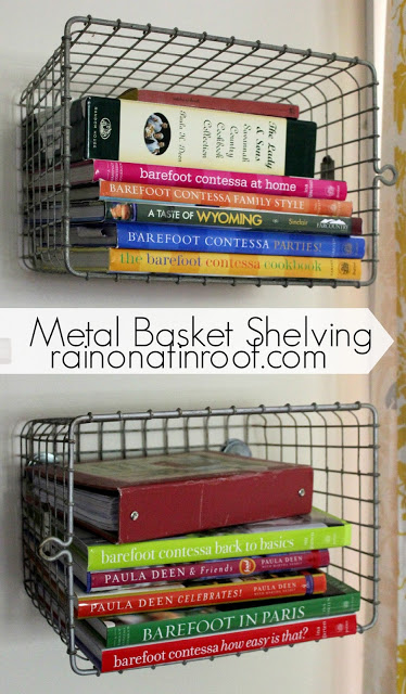 Metal basket shelving attached to the wall with books in them.
