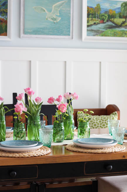 A wooden table set for spring.
