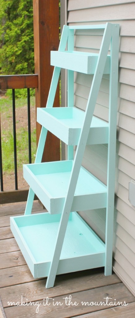 A light blue DIY ladder shelf.
