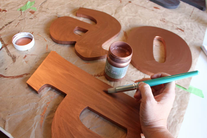 Doing a second coat of paint on the letters.