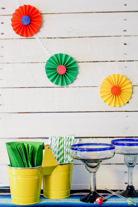 Party decor such as the pinwheel and colourful straws.