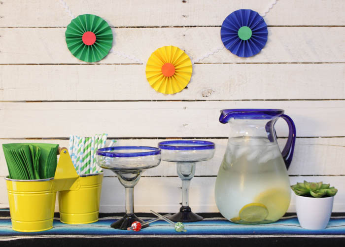 A pitcher with margherita and the pinwheels on the table.
