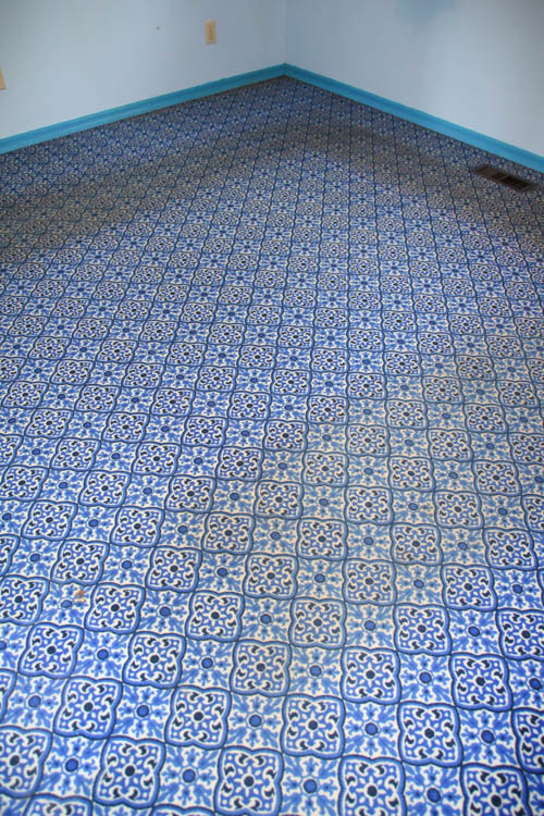 Up close look at the blue patterned rug.