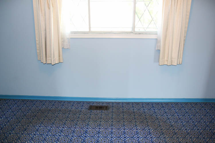 A small window with white curtains.