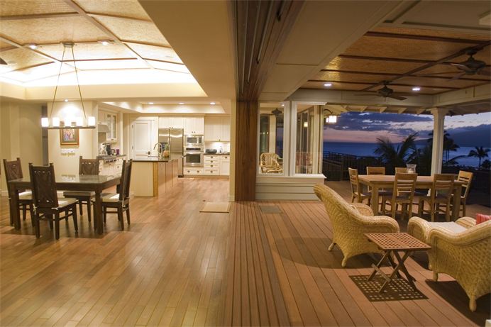 A deck with a retractable wall making it an indoor outdoor deck.