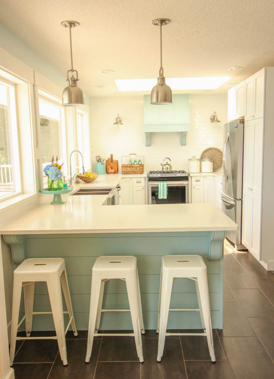 Gorgeous Coastal style white shaker kitchen with aqua blue at thehappyhousie.com-39