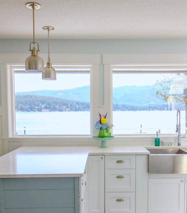 The large windows in the kitchen overlooking the lake.