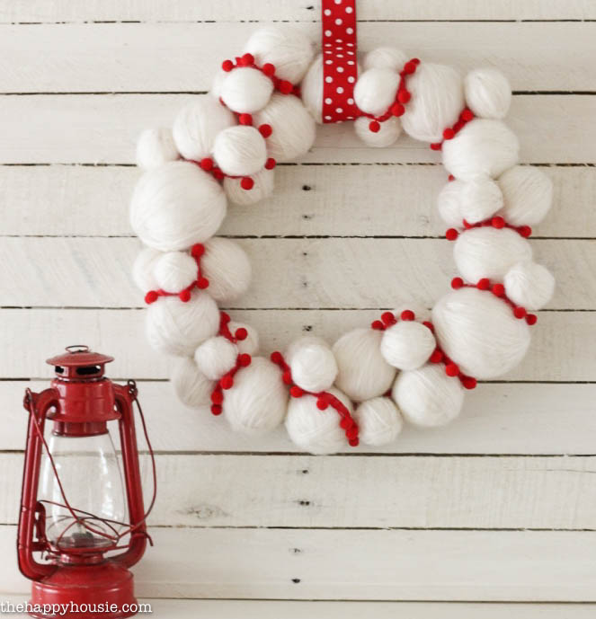 Adorable quick and easy Yarn Snowball DIY Christmas Wreath at thehappyhousie.com-2