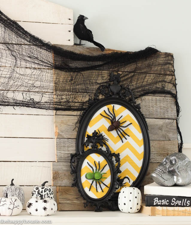 I love this fun black white and yellow Halloween Mantel with all kinds of DIY Halloween Decor projects at thehappyhousie.com-16