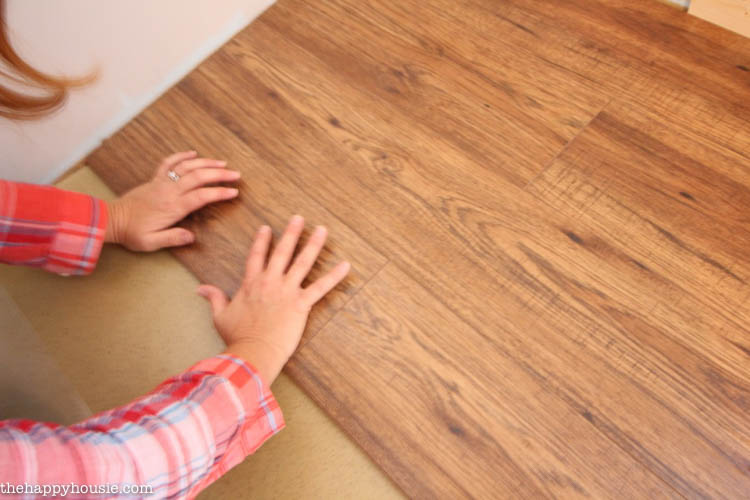 You can give your space an awesome new look on a budget by installing gorgeous Kaindl laminate flooring yourself - we picked ours up at The Home Depot-27