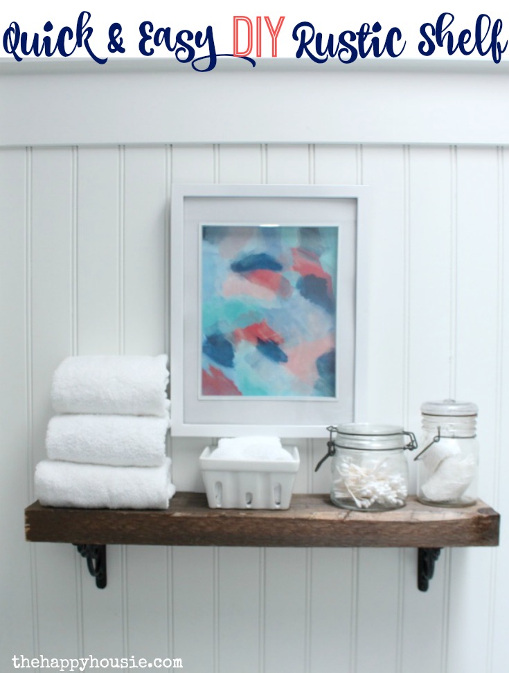 A quick and easy DIY rustic shelf install in our main bathroom at thehappyhousie.com