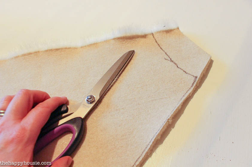 Measuring and cutting the faux fur.