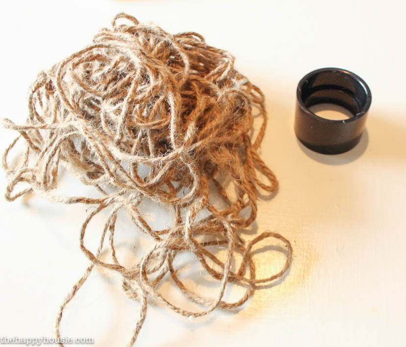 Rustic twine and a holder on the table.