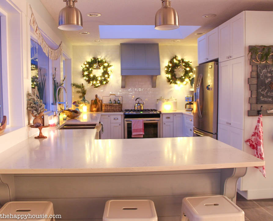 A neutral kitchen decorated for the holidays.