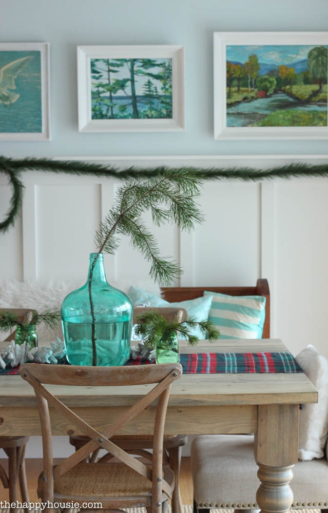 Come tour this Christmas dining with lots of natural and rustic touches and watery green and blues - coastal lake cottage Christmas at thehappyhousie.com-17