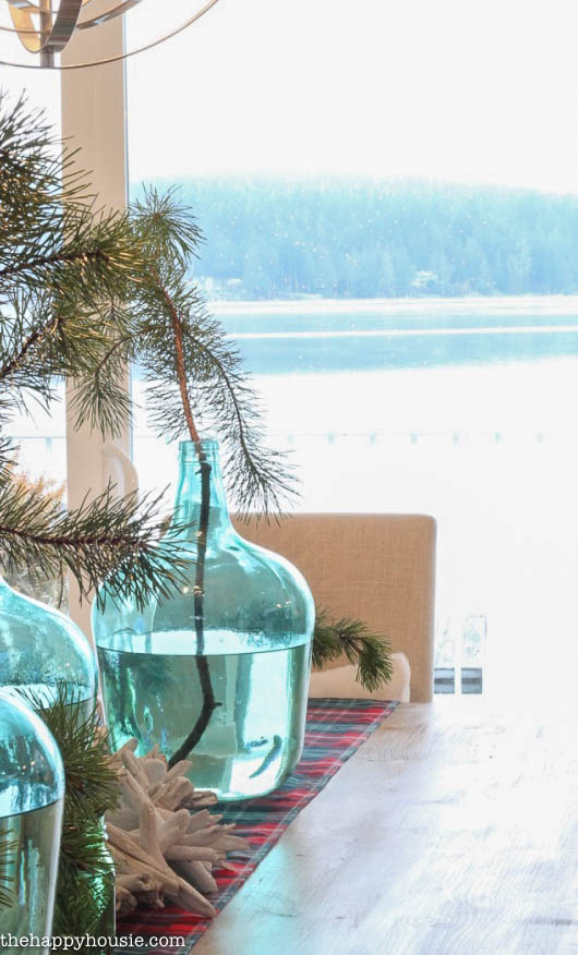 Come tour this Christmas dining with lots of natural and rustic touches and watery green and blues - coastal lake cottage Christmas at thehappyhousie.com-9