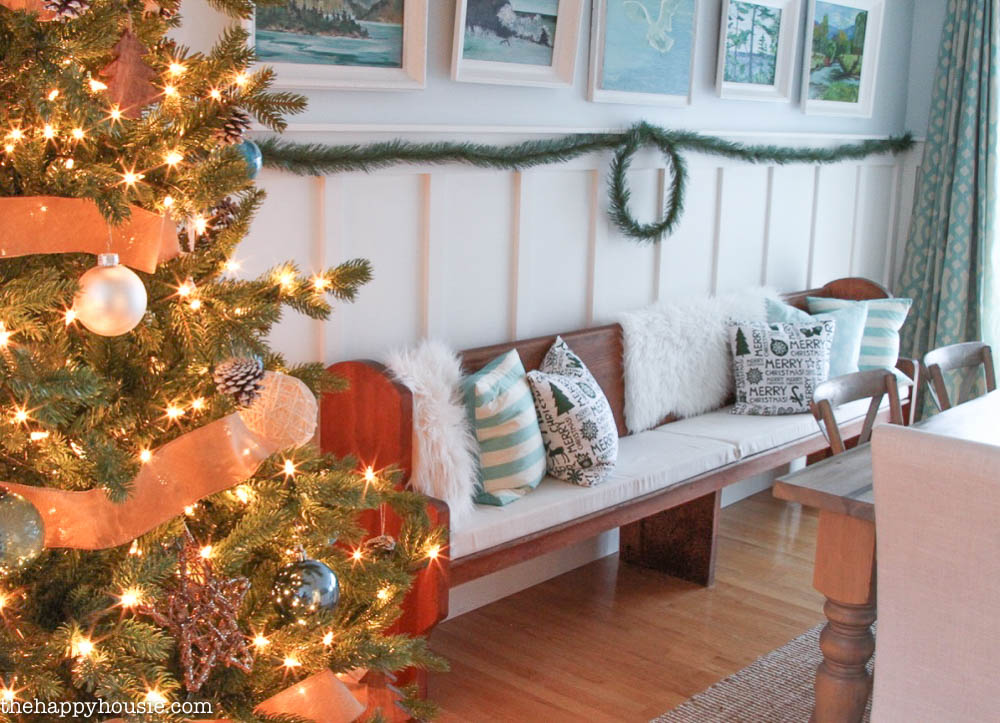 Come tour this Christmas living room with lots of natural and rustic vintage touches as well as hits of red - coastal lake cottage Christmas at thehappyhousie.com-22