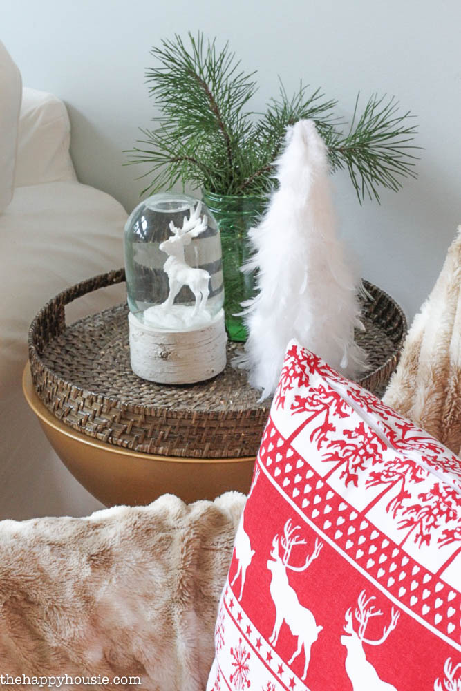 Come tour this Christmas living room with lots of natural and rustic vintage touches as well as hits of red - coastal lake cottage Christmas at thehappyhousie.com-7