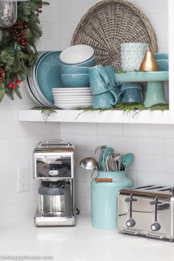 Shelves decorated with kitchen items.