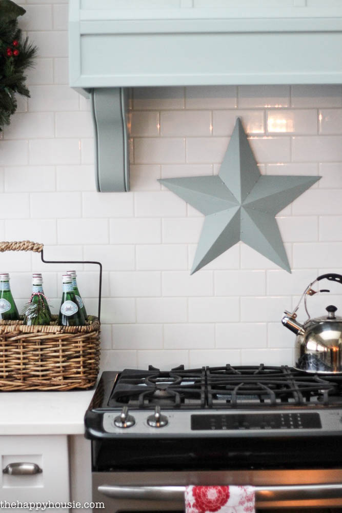 There is a decorative star above the stove in the kitchen.