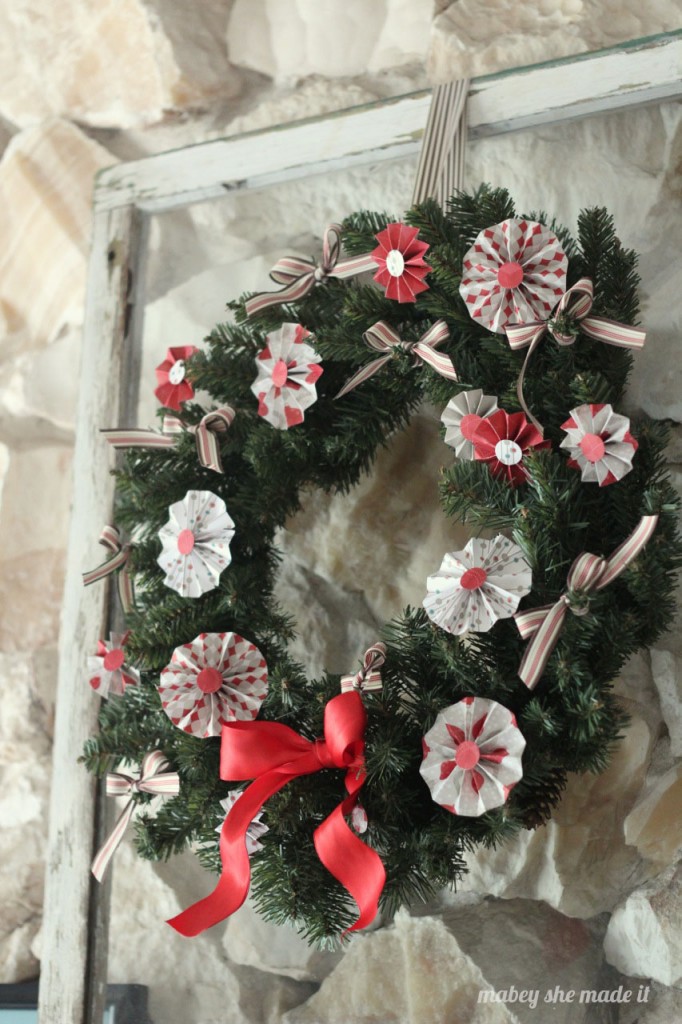 A large medallion Christmas wreath.