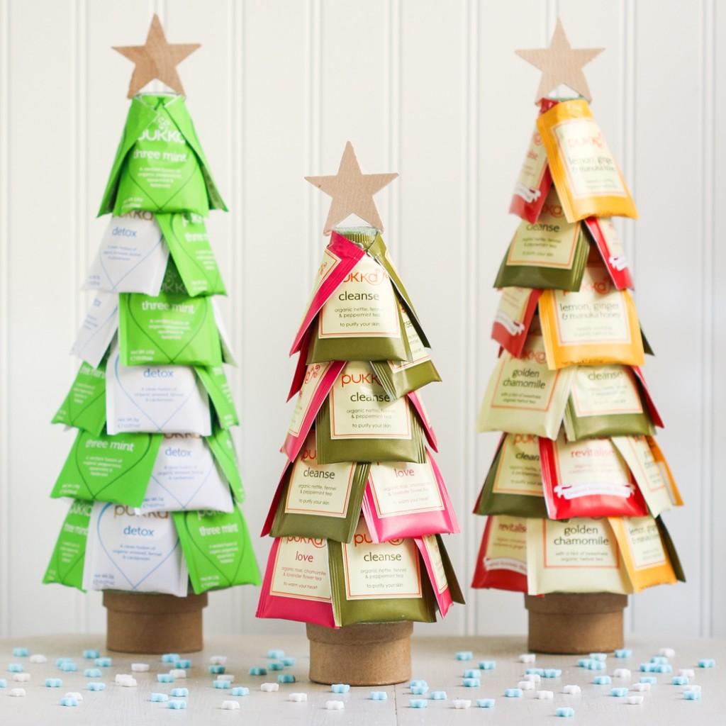 Christmas trees made out of tea packets with a star on the top.