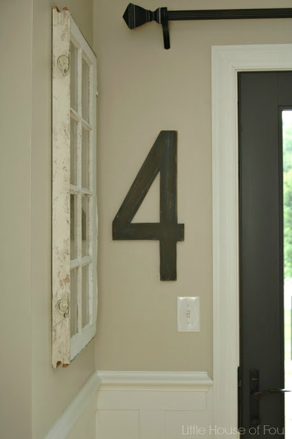 The number 4 painted on the wall.