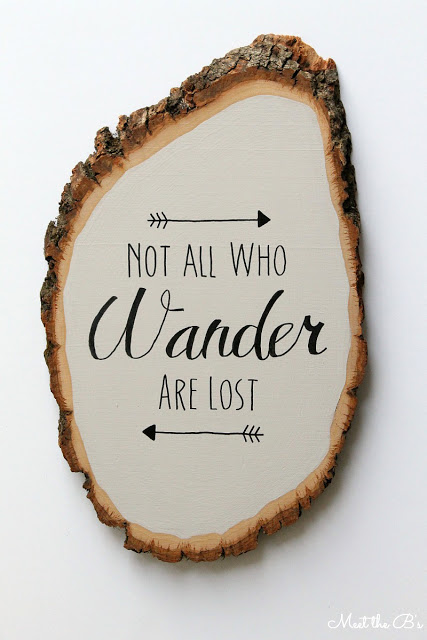 Wood slice that says not all who wander are lost.