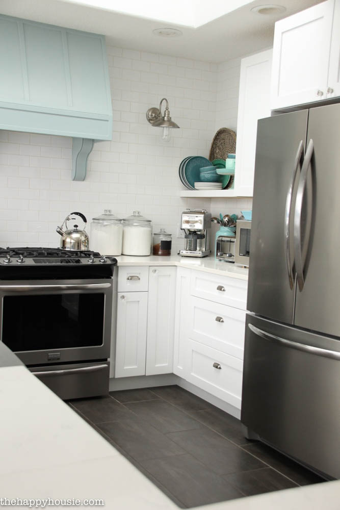 Stainless steel appliances are in the kitchen.