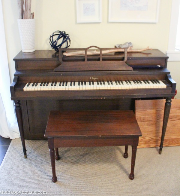 The old wooden piano before picture.