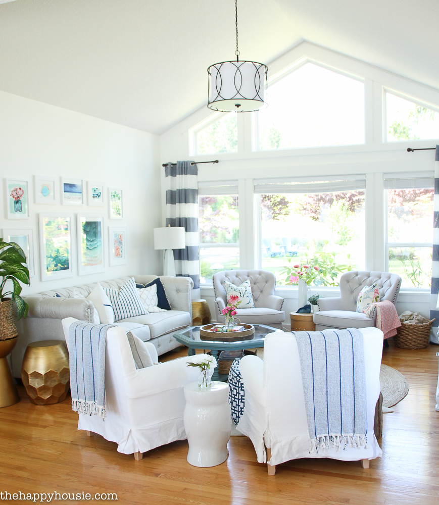 living room makeover with white and blue and vaulted ceilings